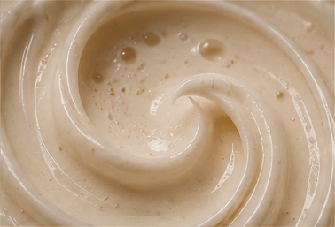 A swirl of pale cream, seen close up
